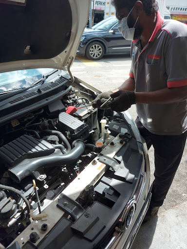 Kedai Battery Kereta R. Muthusamy